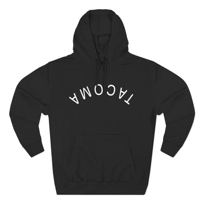 Front view of black hoodie with flipped Tacoma print in white lettering