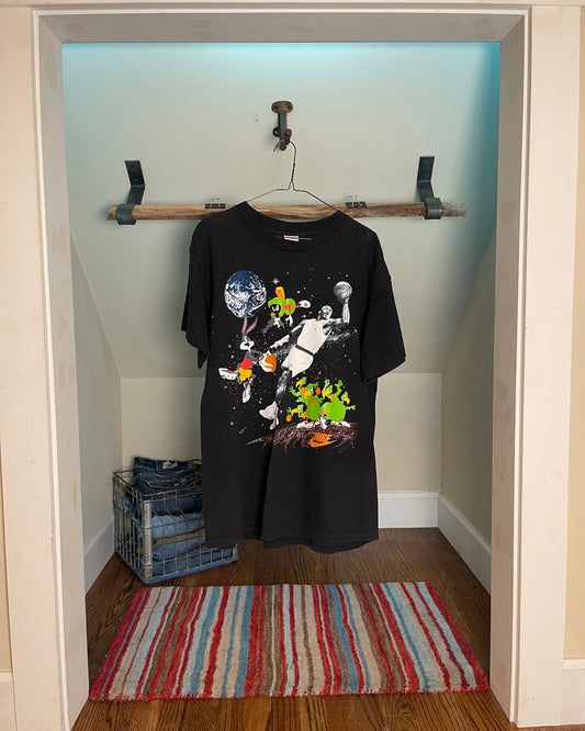 Front of Nike Jordan Space Jam tee with Jordan and Looney Tunes print