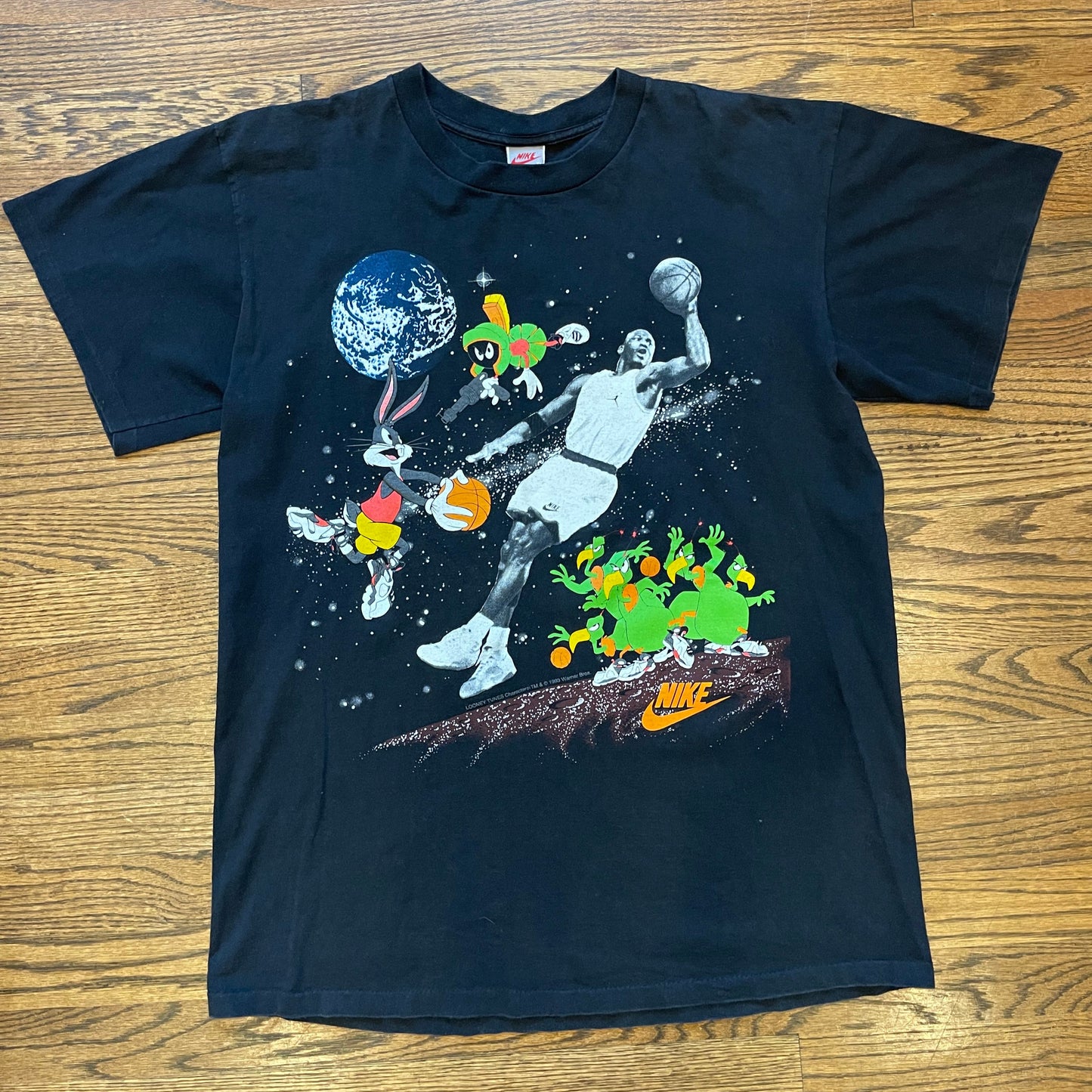 Front of Nike Jordan Space Jam tee with Jordan and Looney Tunes print