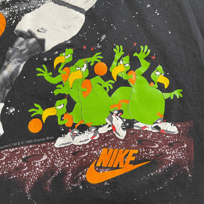 Collage with cartoon character, basketball player, and Nike logo on a dark background