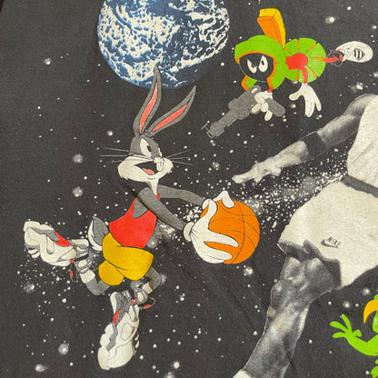 Collage of cartoon characters including Bugs Bunny and a basketball player with Earth in space.